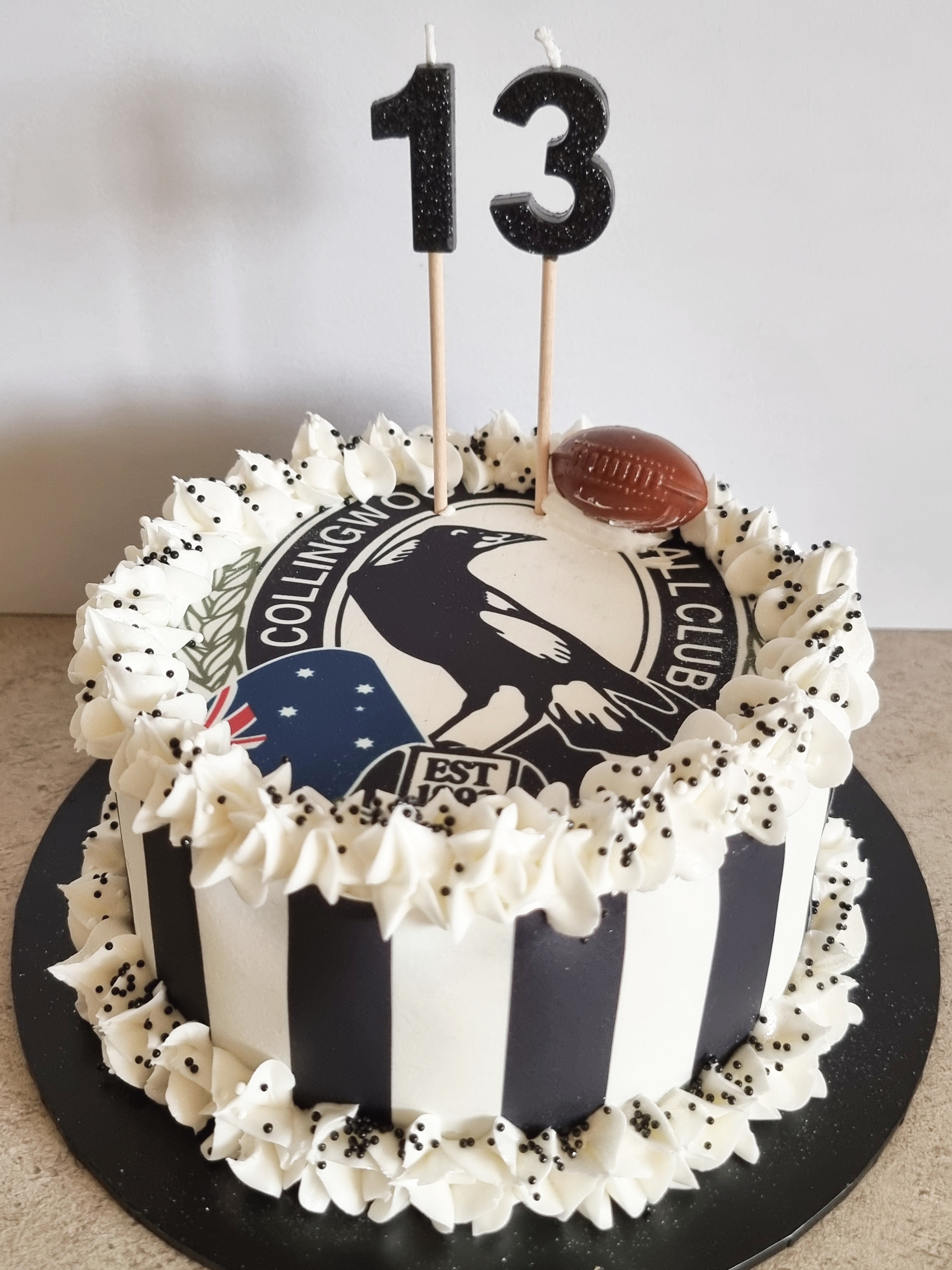 Collingwood Cake . 10inch chocolate mud cake .